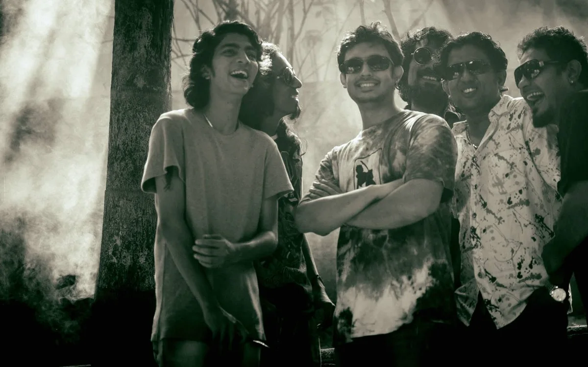 Wagon Park band members sharing a candid moment outdoors