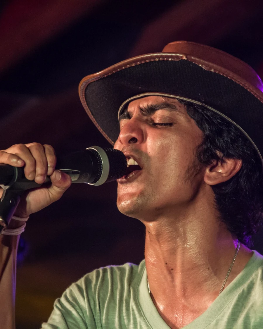 Buddhi de Mel performing lead vocals