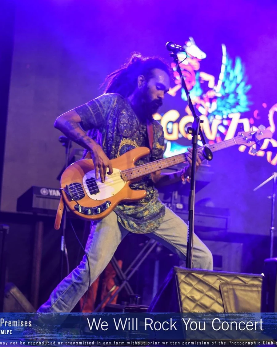 Mohamed Firash playing bass guitar